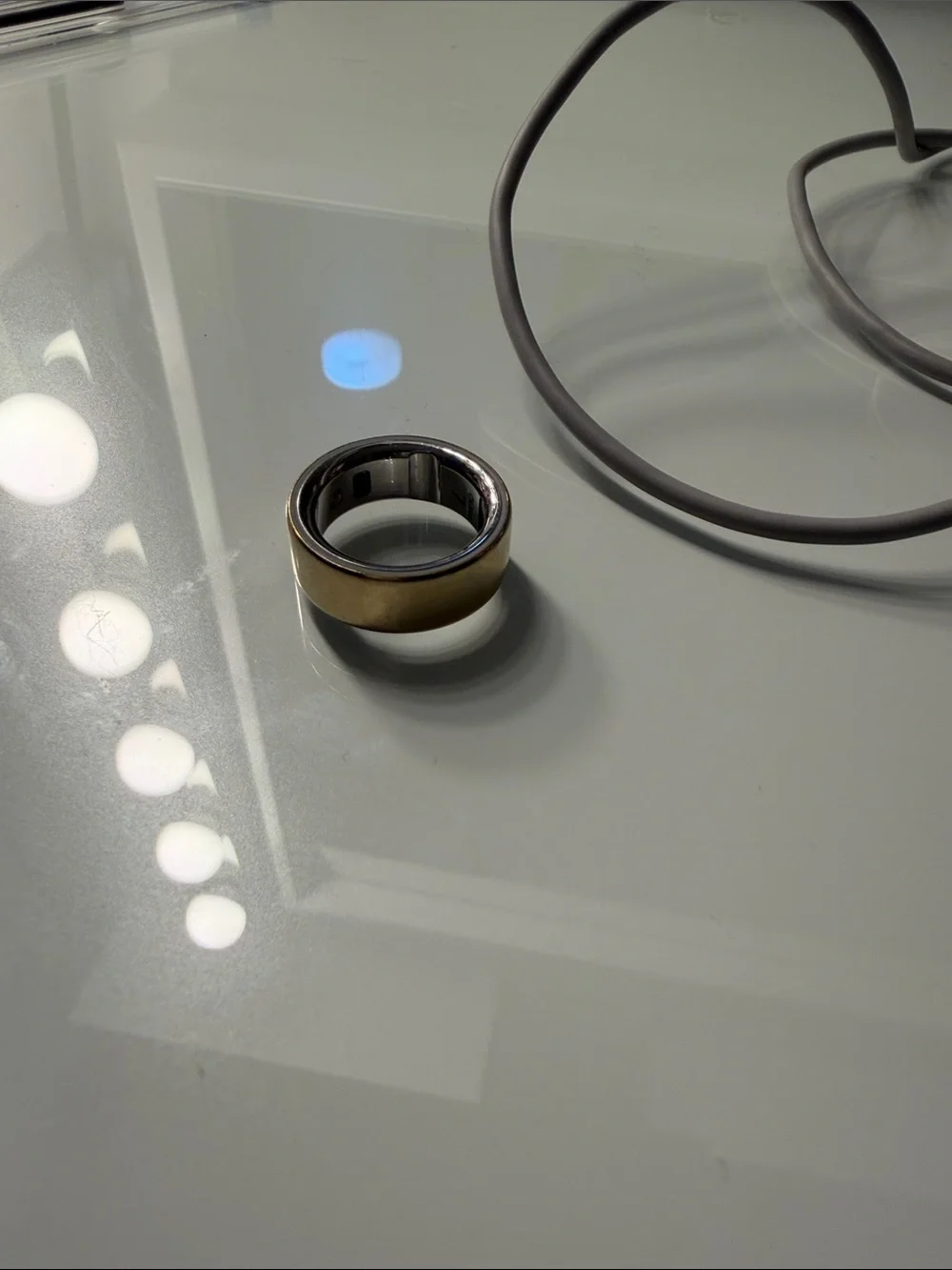 Oura Ring series 4. Size 7. Charging Dock and Cable included.